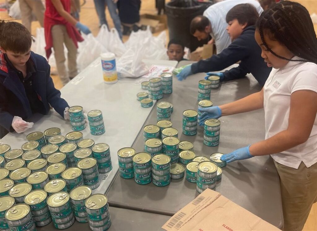 Students sort canned food