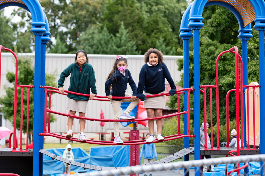 Students on playground bridge